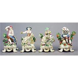 A Bow set of figures emblematic of the Four Seasons, typically modelled with attributes, on gilt...