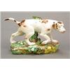 Image 1 : A Derby model of a pointer, en passant before a tree-stump, on a flower-encrusted mound base, the...