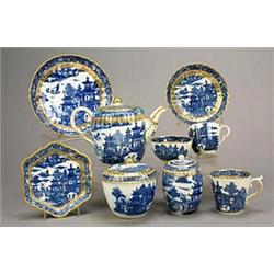 A Caughley fluted part tea service, printed in blue and gilt with the 'Temple' pattern, comprisin...