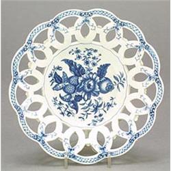 A Worcester blue and white pierced circular basket of interlaced ovals, the well printed with the...