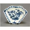 A Worcester blue and white fan-shaped section from an hors d'oeuvres set, painted with a bird amo...