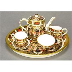 A Royal Crown Derby Solitaire miniature tea service, painted and gilt in the Imari palette, patte...