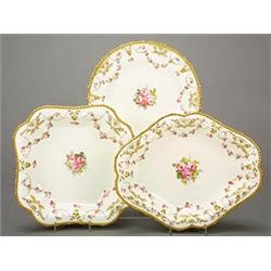 A Royal Crown Derby part dessert service, painted with sprays of pink roses, within a borderr of...