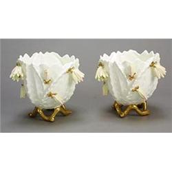 A pair of James Shaw (Longton) Christmas cactus vases, modelled in the manner of Moore Bros., wit...