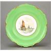 Image 1 : A Royal Crown Derby green-ground plate painted by W.E.J. Dean with fishing boats, within gilt scr...