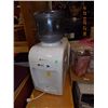 Image 1 : WATER COOLER - COUNTER TOP MODEL WITH SMALL BOTTLE