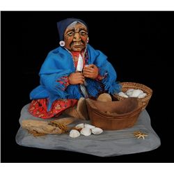 Early 20TH C. Shona Ha Doll of Salish Woman Shucking Clams 11 1/2" L. 12" W.  Good Condition