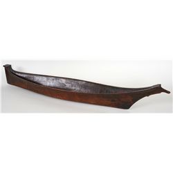 Nuu-chah-nulth Carved Traveling Canoe ca. 1890 with Painted Design Inside 42 1/2" L. 8" W. 8" H.  Go