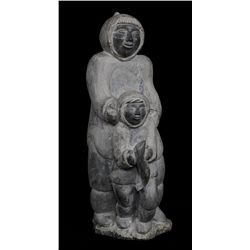 Inuit Soapstone Carving of an Father and Son Marked E5614  18" H. 5" W. 8" Deep  Good Condition with