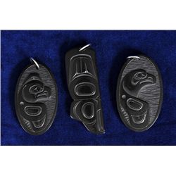 Three Haida Argillite Eagle Pendants Carved by Denny Dixon 1 5/16"x 2 1/4", 1 1/4x 2 1/8" and 15/16"