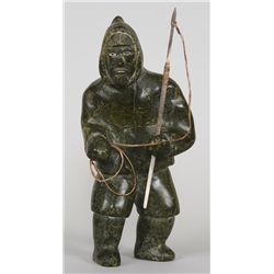 Inuit Serpentine Carving of a Hunter with Spear - Artist Unknown 8 3/4" H. 4" W.  Good Condition