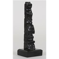 Ed Caulder Argillite Totem Carved with Bear, Raven Holding Copper and Beaver 5" H.  Good Condition w