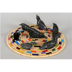 Sarah Mickiyuk Carved Soapstone Seals and Birds on a Basketry Mat - Sanikiluaq  11 3/4" D. 3 3/4" H.