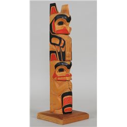 Eagle and Beaver Totem Carved by R. Adams, Yellow Cedar 17 3/4" H. 5 3/4" W.  Good Condition