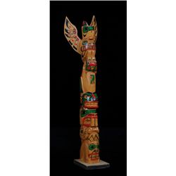 Totem Carved with Thunderbird, Whale and Bear Holding Slave by Harvey Jackson - Prince Rupert, B.C. 