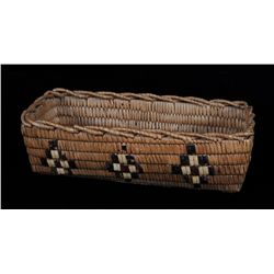 Salish Basket with Diamond Design and Crenulated Rim 12" L. 4 1/2" W.  Good Condition with Minor Los