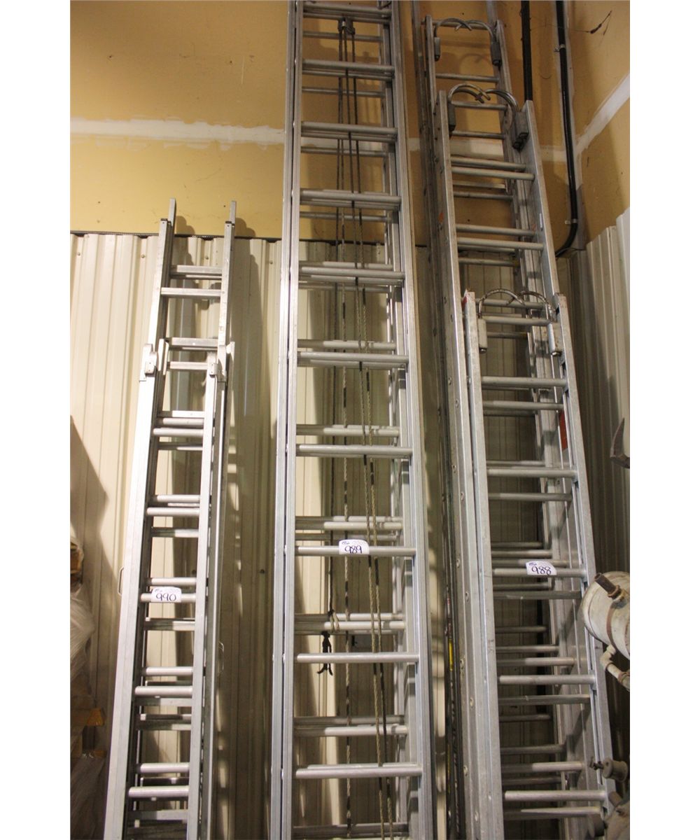 STACK OF HEAVY DUTY EXTENSION LADDERS