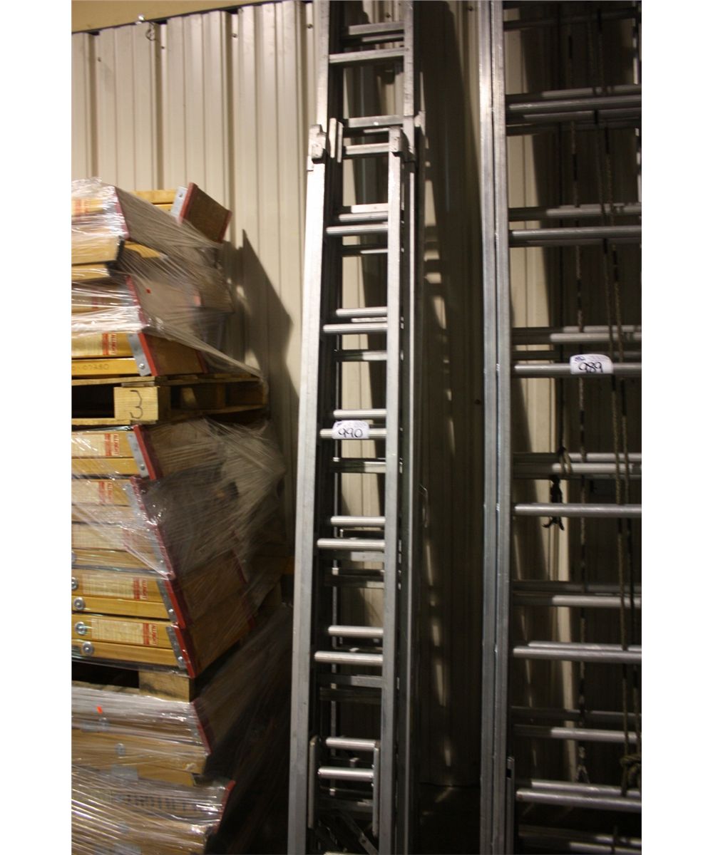 STACK OF HEAVY DUTY EXTENSION LADDERS