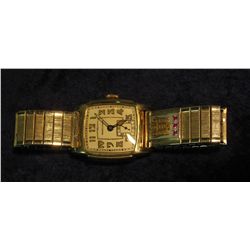 6. Men's Gold-Filled Wrist Watch "Hamilton". (3) Small Red rubies. Coat-of-arms above rubies. Runs.
