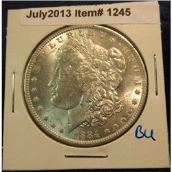 1245. 1884 O Morgan Silver Dollar. Brilliant MS 63