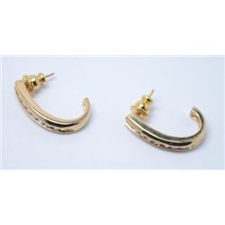 Beautiful pair of .5 ctw Diamond Half Hoop Earrings.