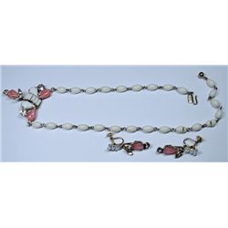 DUANE CIRCA 1950'S MILK GLASS AND RHINESTONE NECKLACE WITH MATCHING EAR RINGS.