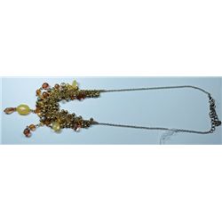 DAINTY BEADED CHAIN NECKLACE WITH SOFT TONES OF BROWN AND YELLOW. 10 IN IN LENGT