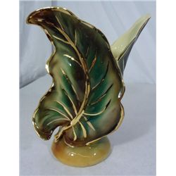 SHAWNEE LEAF VASE. ONE OF THE TOP CORNERS IS BROKEN OFF