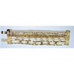 Signed Gold and White Multi-stand bracelet.