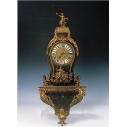 Reloj "cartel" estilo Regencia, con trabajo Boulle montado en bronce dorado.Trabajo franc‚s, ffs....