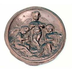 A 17th century Italian bronze circular plaquette cast with winged amorini playing musical instrum...