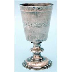 An Elizabethan provincial silver communion cup with moulded rim over a simple band of stylised ac...