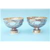 Image 1 : A pair of Victorian silver rose bowls, the hemispherical fluted bodies chased with repousse folia...