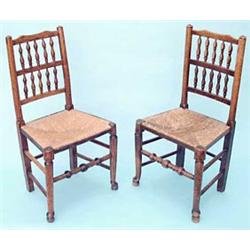 A matched set of eight 19th century ash, elm, fruitwood and beech spindleback dining chairs havin...