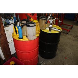 2 PARTIAL BARRELS OF MOTOR OIL WITH PUMPS