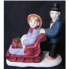 Image 1 : NAZI PORCELAIN MAN & WOMAN SLEDDING FIGURINE W/SWASTIKA