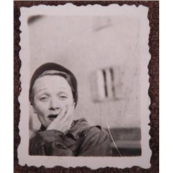 PHOTO OF MARLENE DIETRICH LOOKING AT HORRORS OF A CONCE