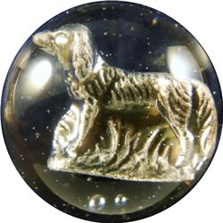 Marbles: Lot 63. Sulphide. Running Dog. 1-1/2". Polished.