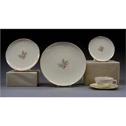 FORTY-NINE PIECE LENOX PORCELAIN PART DINNER SERVICE American. By Lenox. In the "Wheat" pattern....
