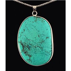 96.93CTW BIG SLICE TURQUOISE IN SILVER BEZEL PENDANT