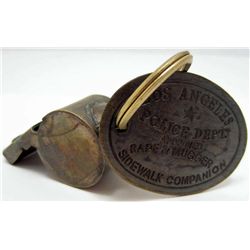 4583 - LAPD BRASS WHISTLE W/ "APPROVED RAPE & MUGGER SIDEWALK COMPANION" TAG
