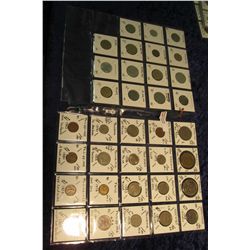 6. (35)  World Coins in 2  x 2  plastic pages. Mexico through Yugoslavia. Total KM catalog value $14