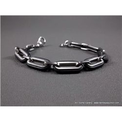 Stainless Steel & Black Rubber Oval Link Bracelet Weight: 23.2 Grams Retail: $49.00