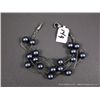 Image 1 : Liquid Sterling Silver and Grey Pearl Like Stone Bracelet Weight: 14.1 Grams Retail: $149.00