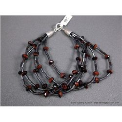 Multi-Strand Dark Brown Beaded Bracelet w/ Sterling Silver Clasp Weight: 13.6 Grams Retail: 449.00