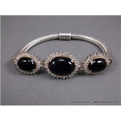 Sterling Silver Cable Bracelet w/ Black Onyx and CZ Stones Weight: 43.9 Grams Retail: $1,200.00