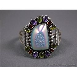 Sterling Silver Bracelet w/ Large Gem and Multi- Colored Gems Weight: 53.4 Grams Retail: $640.00