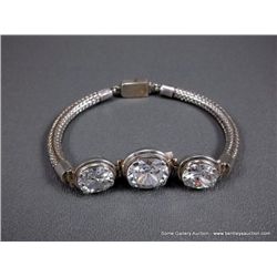 Sterling Silver Cable Bracelet w/ Clear Large CZ Stones Weight: 45.9 Grams Retail: $1,200.00