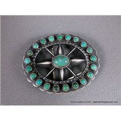 Silver Belt Buckle with Green Turquoise Stone- Marked MCD Weight: 59.6 Grams Retail: $440.00