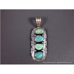 Turquoise and Sterling Silver Pendant-Marked J. Johnson Weight: 32.2 Grams Retail: $595.00